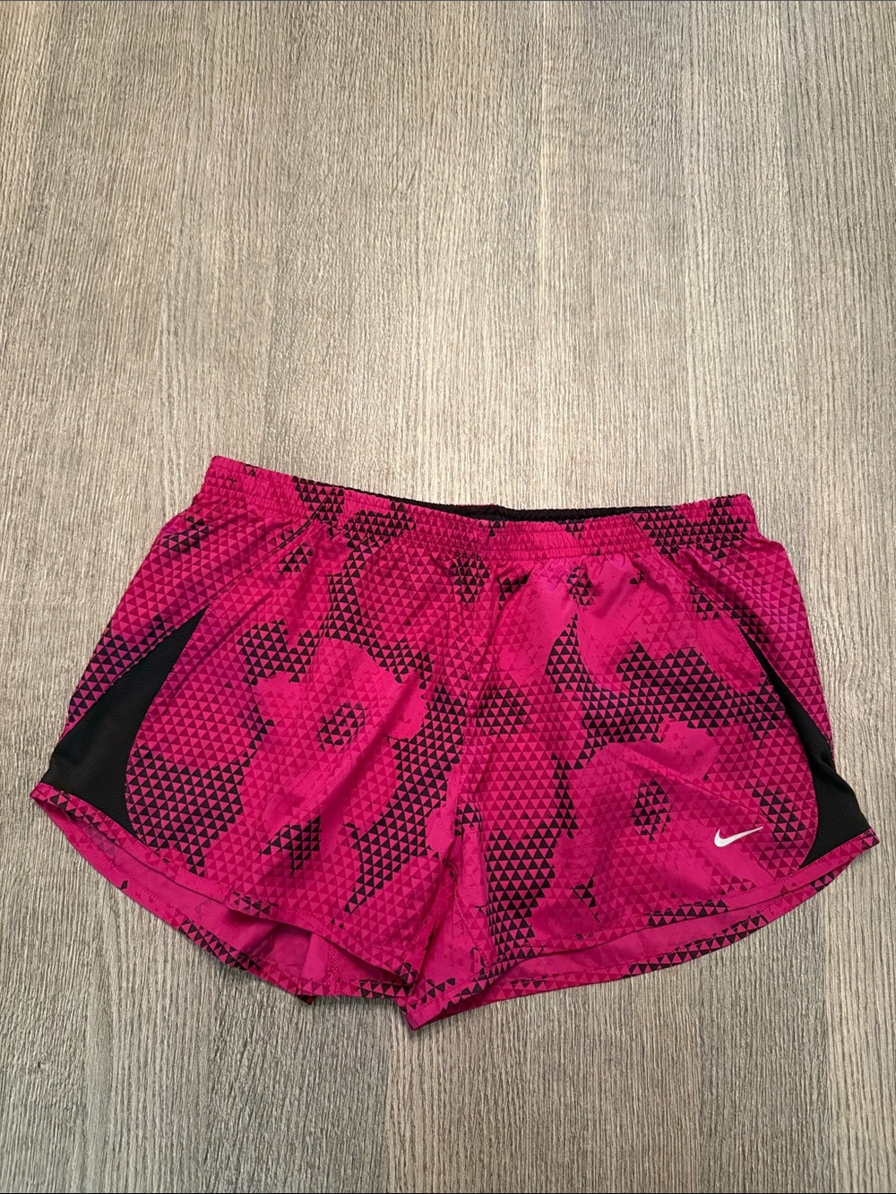 Nike Women's Pink Patterned Athletic Shorts with Black Accents